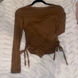 Long sleeve tee with drawstring sides